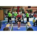 Foto: Sportlerin verlässt das Podest.