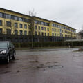 Foto vom 11. Dezember 2014: Blick auf die regennasse Straße und das Klinikumbettenhaus Foto vom 11. Dezember 2014: Blick auf die regennasse Straße und das Klinikumbettenhaus